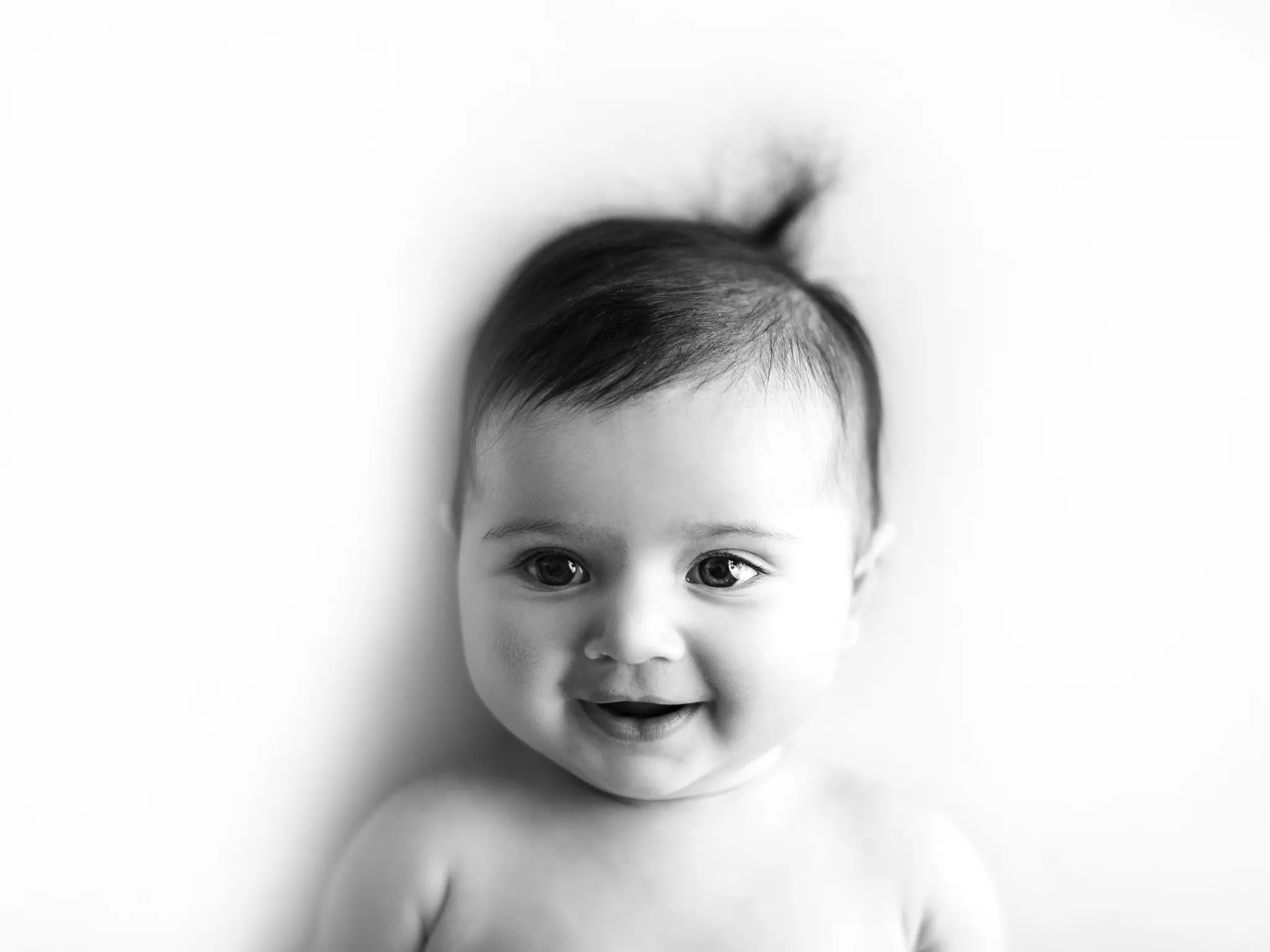milestone-photography-oshey-vargas-photography-portrait-photographer-smiling-expressions-baby-b&w-mckinney-texas